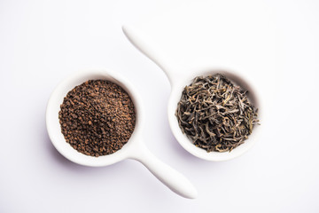 Black Tea Powder or dry dust with or without green leaf and served hot chai in a cup