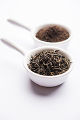 Black Tea Powder or dry dust with or without green leaf and served hot chai in a cup