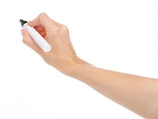 Black marker in hand on a white background. Isolation