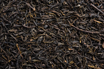 Black Tea Powder or dry dust with or without green leaf and served hot chai in a cup
