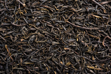 Black Tea Powder or dry dust with or without green leaf and served hot chai in a cup