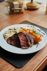 Fillet of beef with mushroom sauce and potatoes