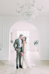Fototapeta premium Stylish wedding in St. Petersburg. Russian wedding in European style in the Studio. Fine art in photography.