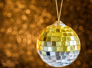  Defocused Abstract Blurred Shiny Christmas Background with Sparkles Golden Ball   Decoration Happy New Year  Festive Holiday  with Light Effect Boke Space for text Selective focus