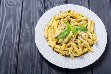 Italian penne pasta with sauce pesto