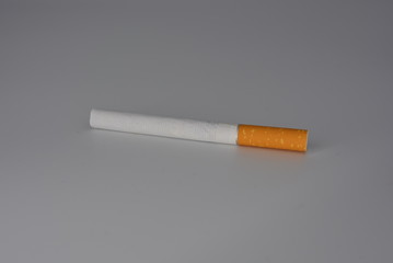 Cigarette, cigarettes with tobacco and cigarette sets on a white background, smoking and harm to health