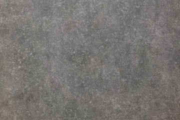 Dark stone or slate wall.Grunge background. Gray stone background