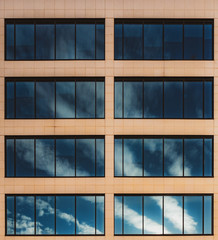 Clouds reflected in windows