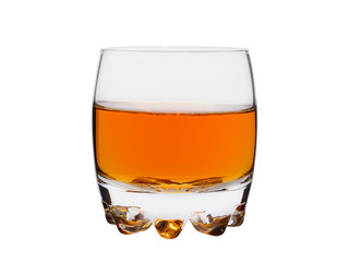 glass of whisky or cognac on a white background