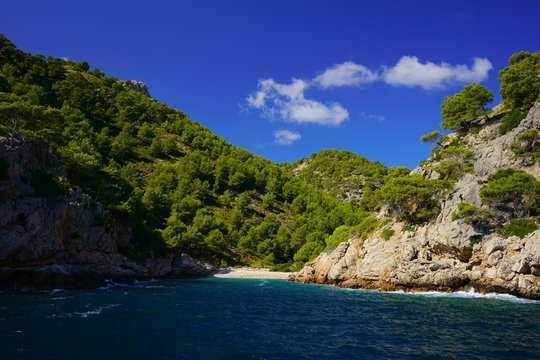 A lonely, natural and heavenly beach in northern Mallorca. Cala en Feliu near Cala Murta, Port de Pollenca, Mallorca, Balearic Islands, Spain.