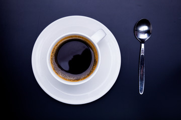 Cup of black coffee on table top view, flat lay, mock up. Cup of Black Coffee in White Ceramic Cup on plastic Tabletop