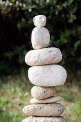 small sculpture on a stack of pebbles.