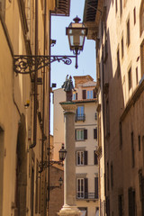 Fototapeta na wymiar old street in florence italy during summer