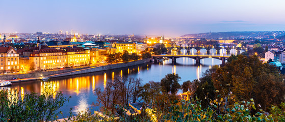 Fototapeta premium Prague bridges over Vltava River in the evening, Praha, Czech Republic
