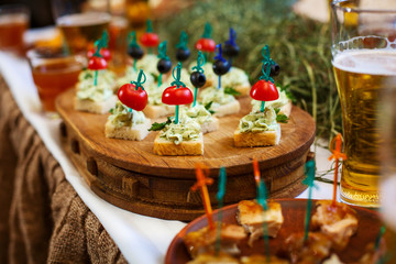 Delicious snacks for beer with a mug of beer.