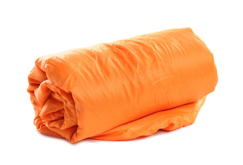 Rolled sleeping bag on white background. Camping equipment