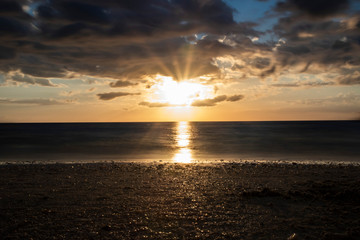 Naklejka premium blue sky ocean sunset