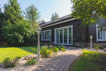 Small garden in front of the countryhouse, summertime