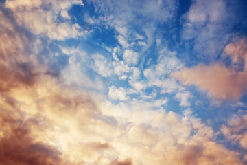 Naklejka na ściany i meble Dramatic sky with clouds background. Blue sky with colored clouds.