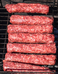 Moldovan mititei and cooked on the grill in the smoke.
