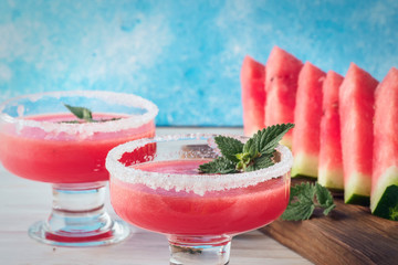 Drink smoothies from red watermelon in glass dishes