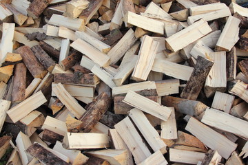 Chipped wood in a pile - pattern, texture, background, preparing for winter
