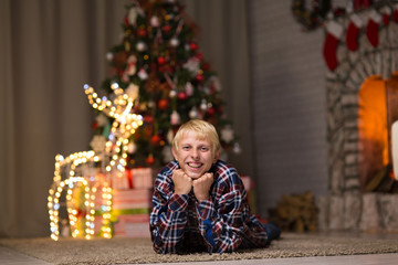 guy near christmas tree