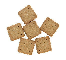 Top view of several lemon creme cookies isolated on a white background.