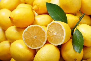Keuken foto achterwand Eetkamer verse citroenen als achtergrond, bovenaanzicht