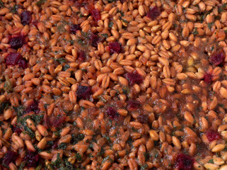 Close view of cooked farro with beets and spinach.