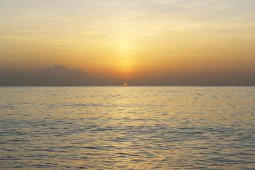 Barbados yellow orange sunset and blue ocean