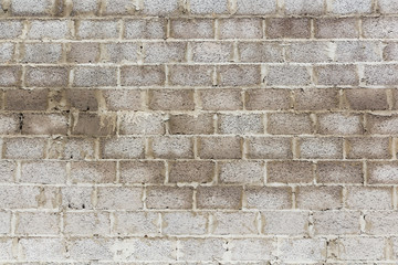 Old concrete block wall background and texture.