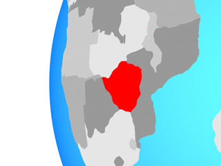 Zimbabwe on blue political globe.