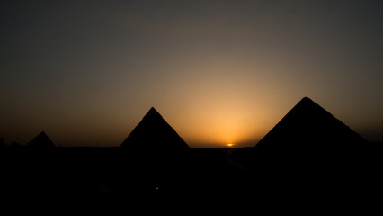 Fototapeta na wymiar Sunset of Giza pyramid complex at sunset time. Egypt
