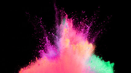 Multi-color powder explosion on black background