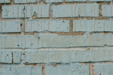 old painted blue brick wall background in Kyiv, Ukraine