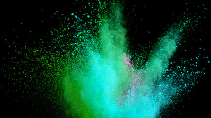 Multi-color powder explosion on black background