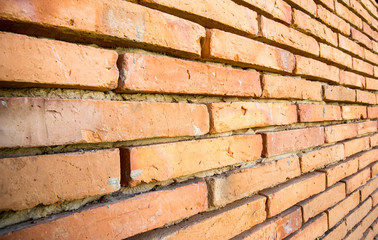 Red brick wall  background - texture pattern for continuous replicate.Grunge red dirty brick wall underground texture.old wall of red and orange bricks for background.