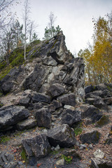 Untreated rough natural gray stone in everyday environment
