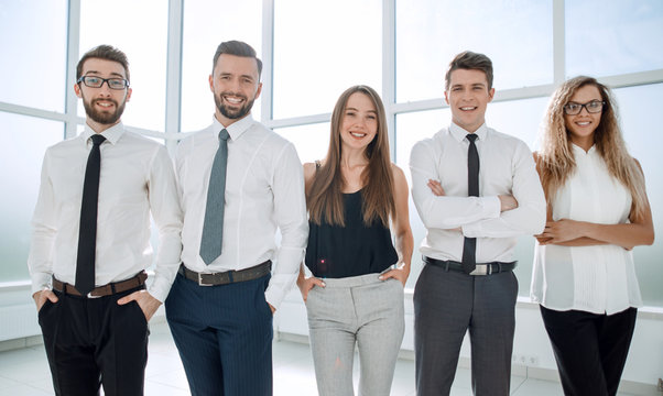 confident business team standing in the office