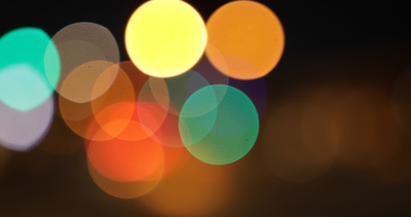 Multi-colored traffic bokeh car headlights moving for green screen