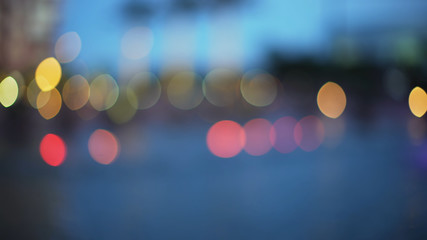 Blue water with yellow and purple bokeh glowing for green screen