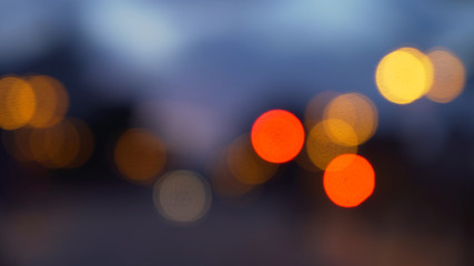 City bokeh lights with glowing traffic lights for green screen