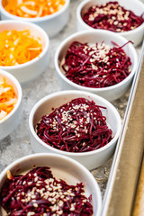 catering table with salads