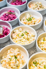 catering table with salads