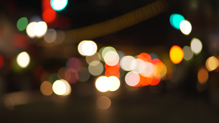 Fototapeta premium Background plate of out of focus city traffic at night