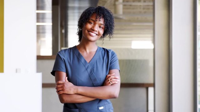 Young Black female doctor wearing scrubs
