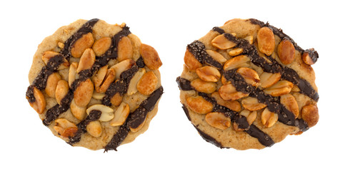 Top view of two chocolate striped peanut cookies isolated on a white background.