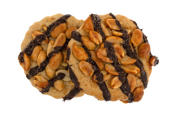 Top view of two chocolate striped peanut cookies isolated on a white background.
