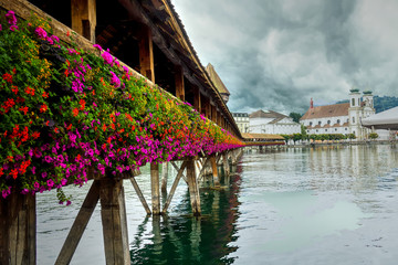 Flower Studed Chapel Bridge-the oldest wooden bridge in Swiss history. Lucerne, Switzerland.